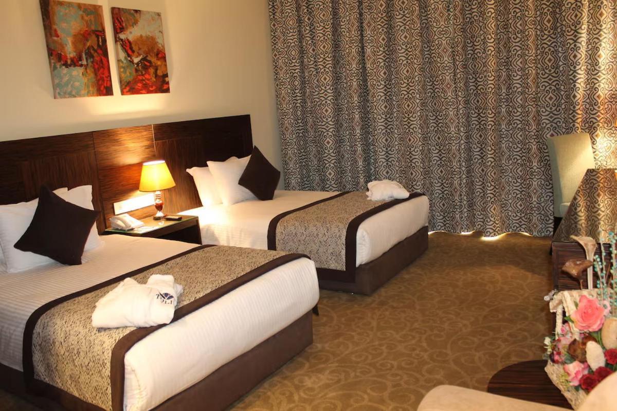 Tolip El Forsan Hotel Ismailia Ngoại thất bức ảnh A room at the hotel